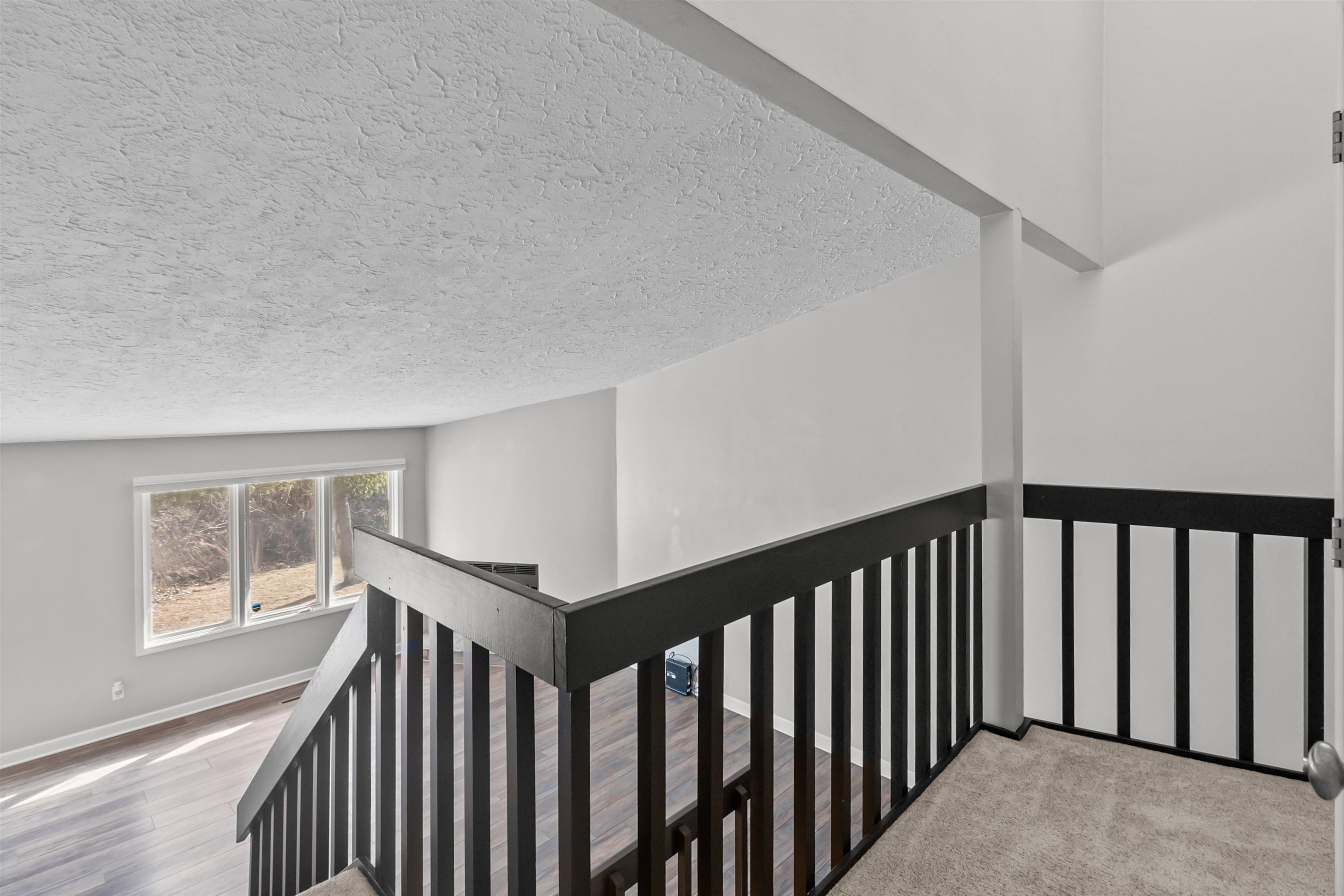 4657 High Point Drive, Unit 32 Rockford, IL 61114 - Photo 12 of 27 a view of a hallway with windows