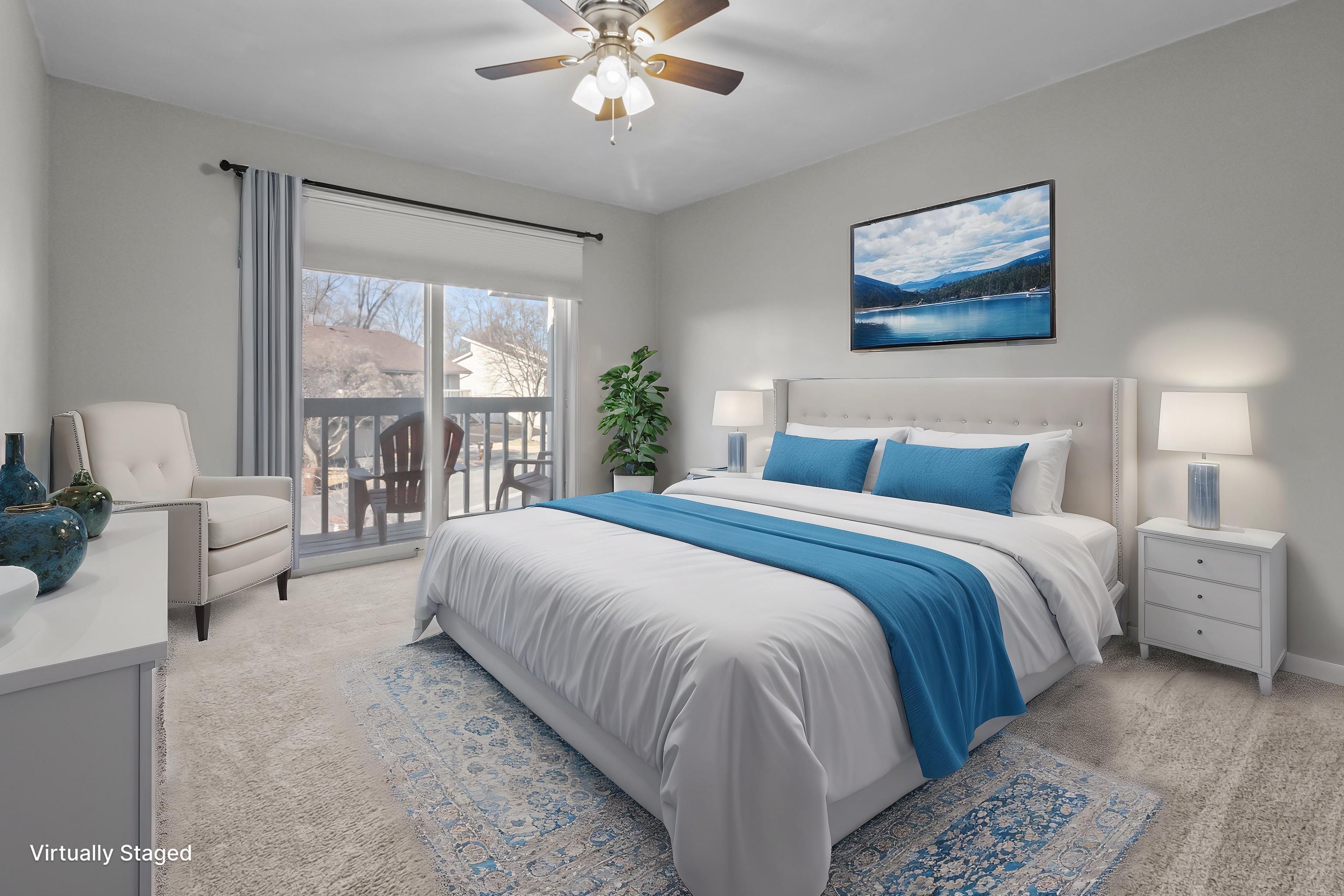 4657 High Point Drive, Unit 32 Rockford, IL 61114 - Photo 15 of 27 a bedroom with a large bed and a large window