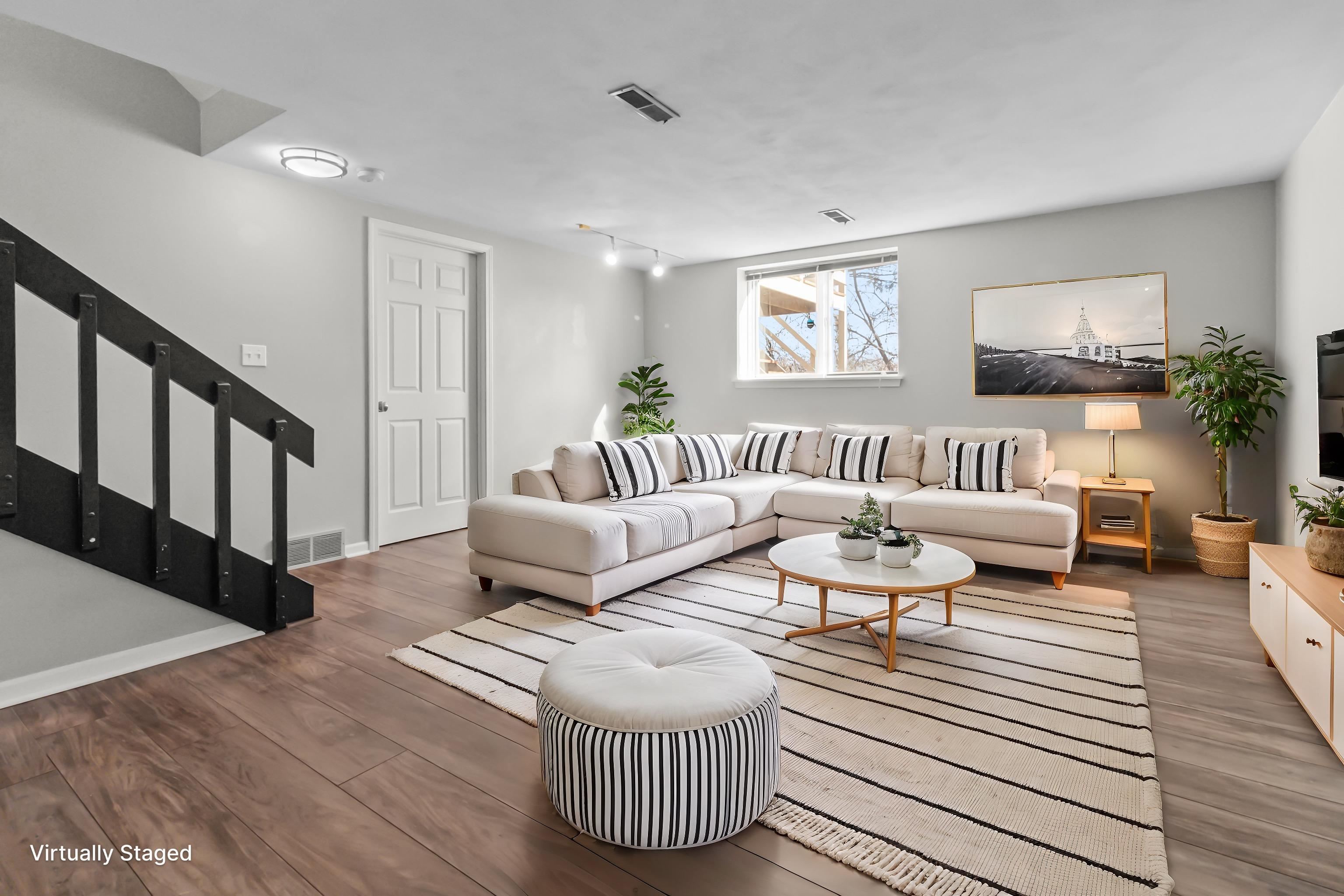 4657 High Point Drive, Unit 32 Rockford, IL 61114 - Photo 19 of 27 a living room with furniture and a couch