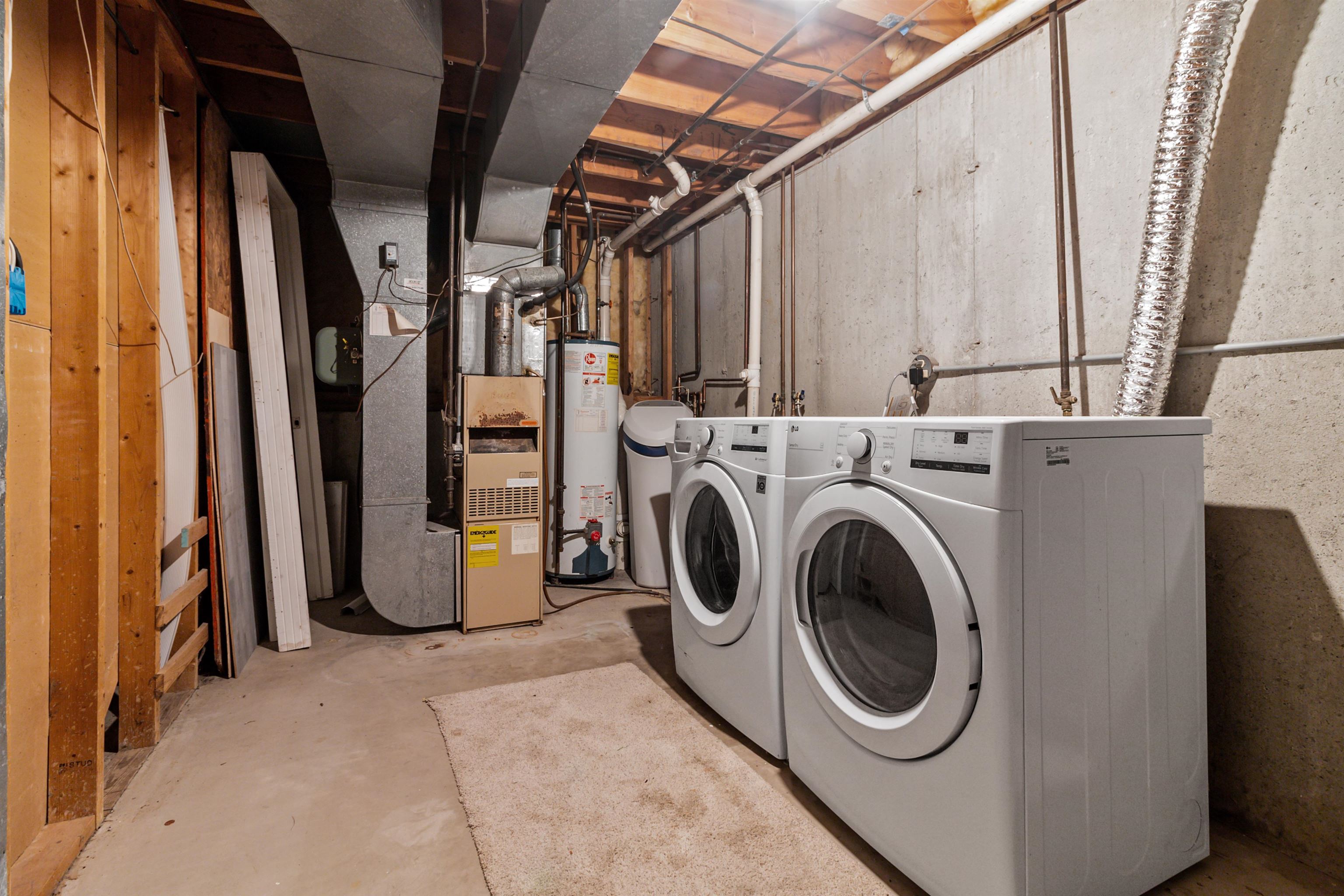 4657 High Point Drive, Unit 32 Rockford, IL 61114 - Photo 21 of 27 a utility room with dryer and washer