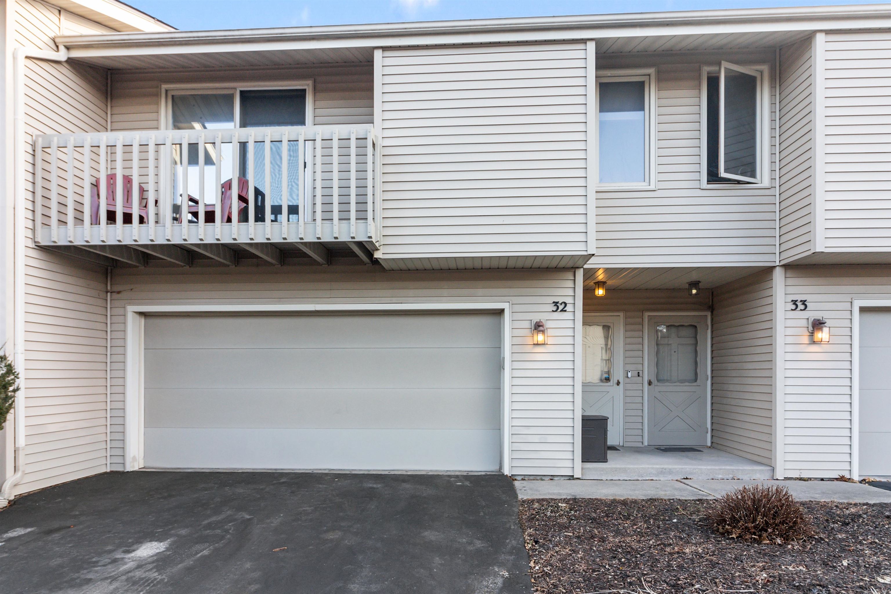 4657 High Point Drive, Unit 32 Rockford, IL 61114 - Photo 3 of 27 a view of a house with a balcony and garage
