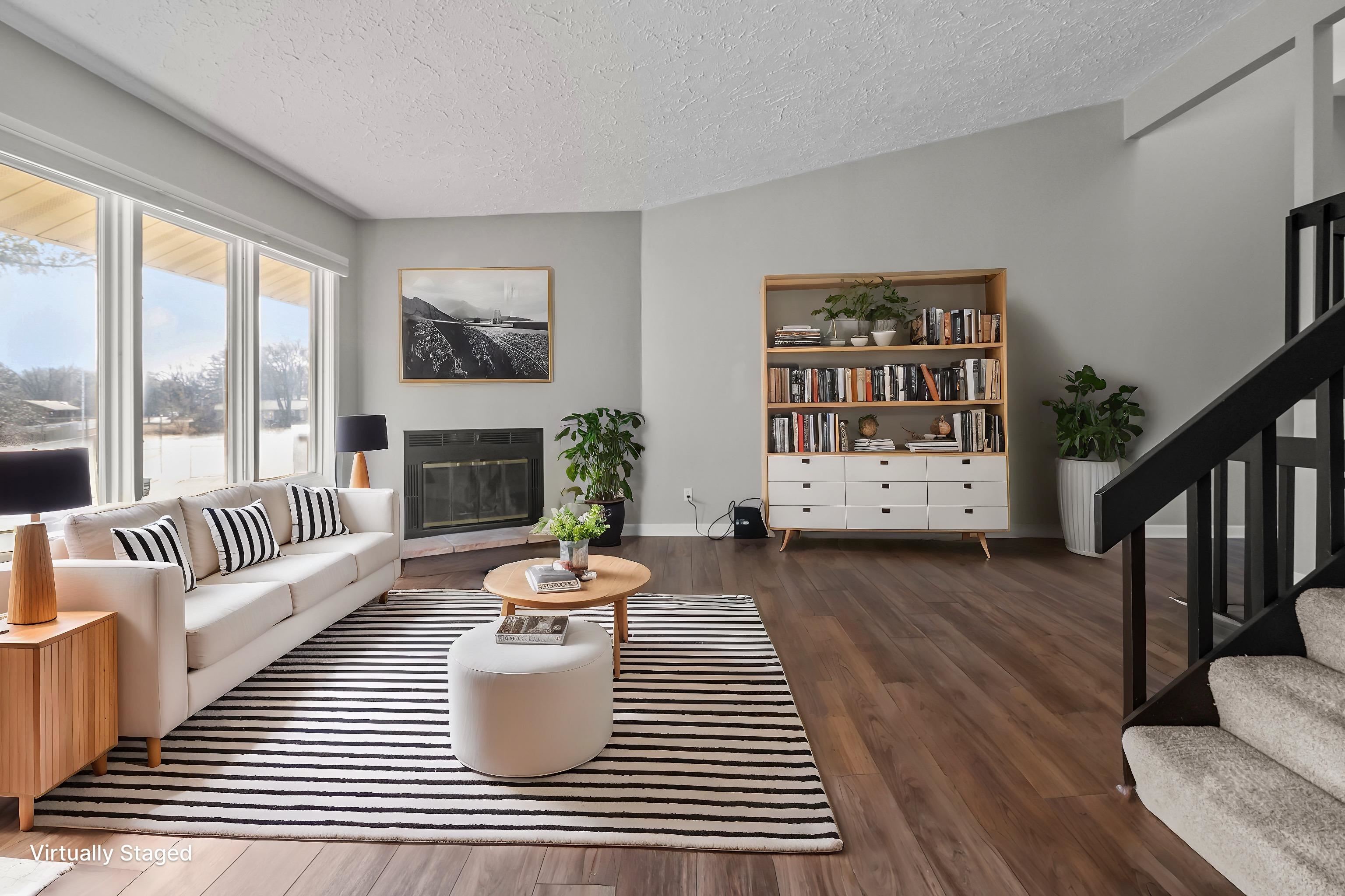 4657 High Point Drive, Unit 32 Rockford, IL 61114 - Photo 7 of 27 a living room with furniture and wooden floor