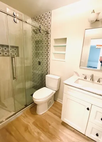 a view of a city with big trees