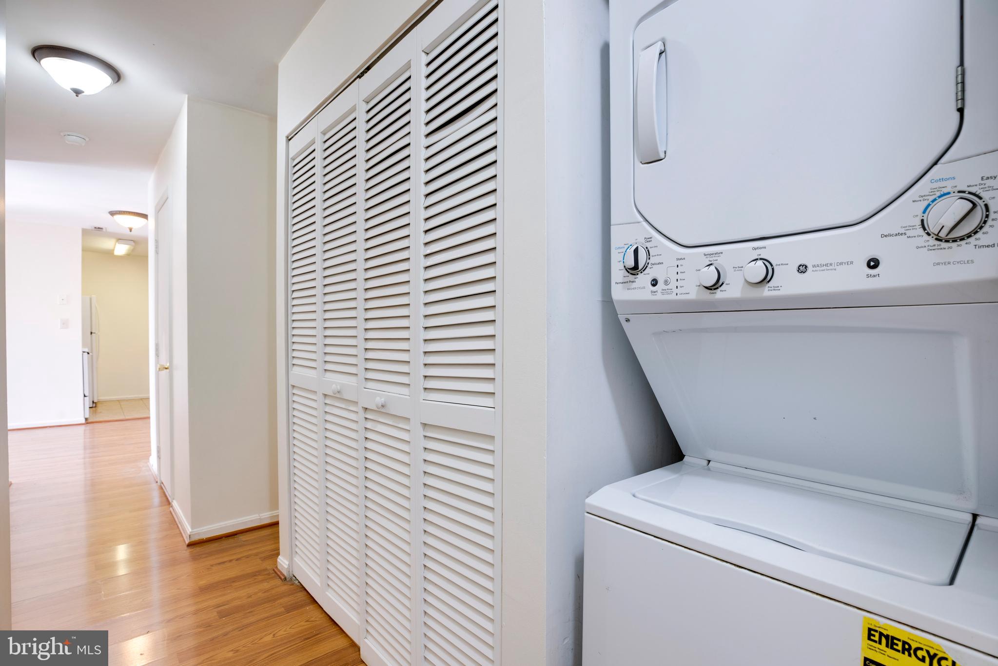 40 Smokewood Court, Unit 40200 Stafford, VA 22554 - Photo 11 of 26 a view of washer and dryer with bathroom in the background