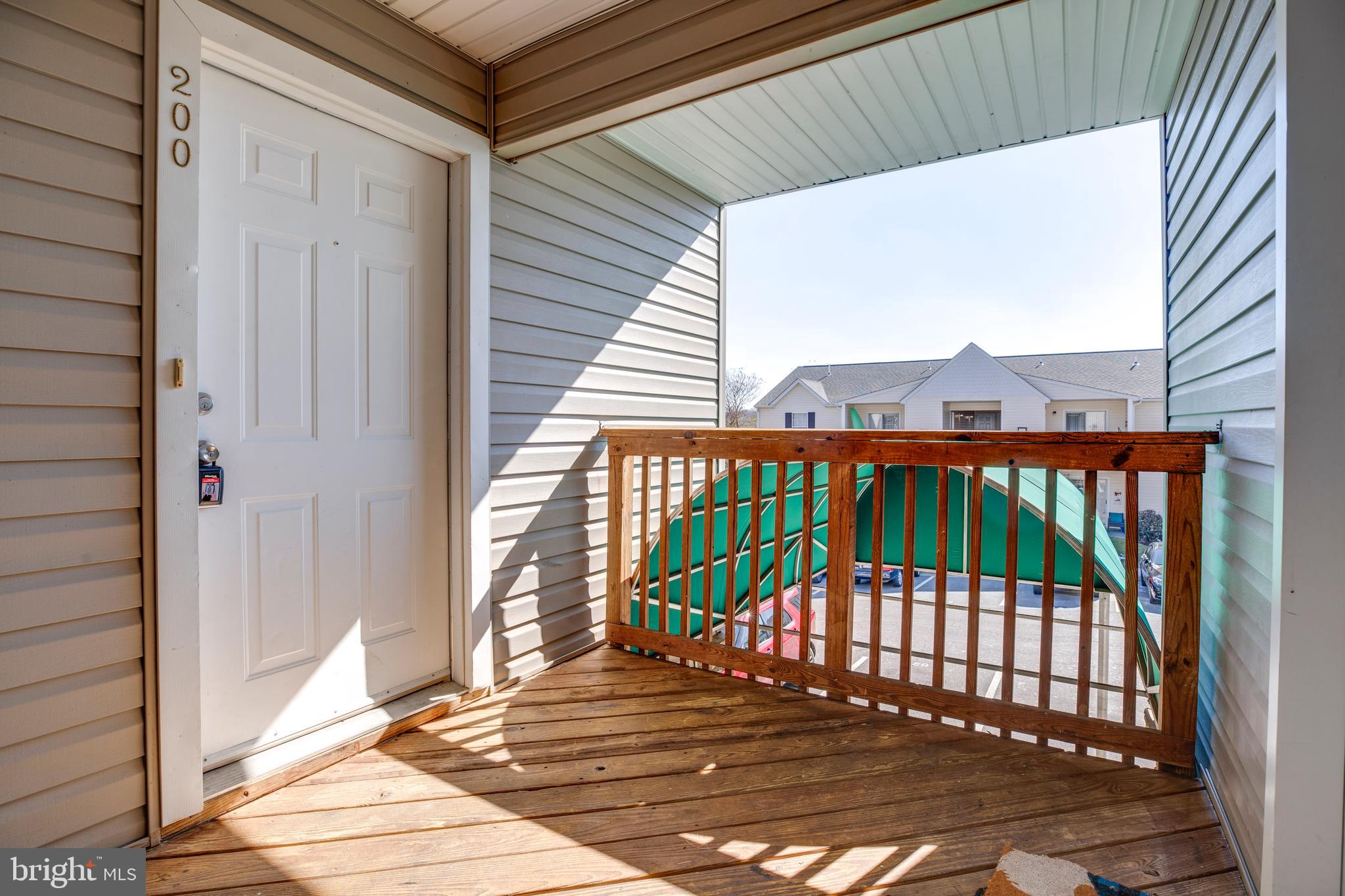 40 Smokewood Court, Unit 40200 Stafford, VA 22554 - Photo 25 of 26 a view of a balcony with a floor to ceiling window