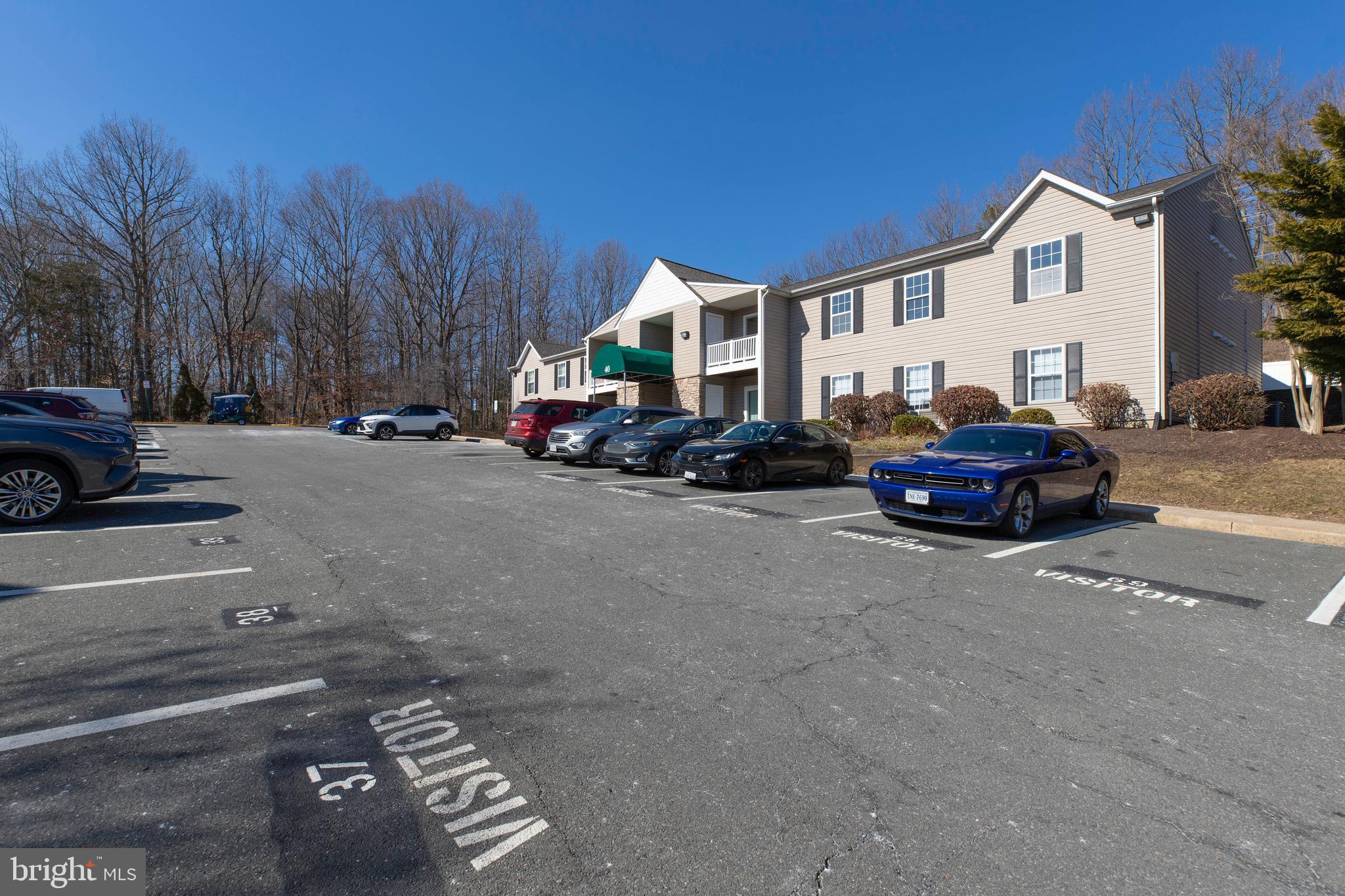 40 Smokewood Court, Unit 40200 Stafford, VA 22554 - Photo 26 of 26 a car parked in front of a house
