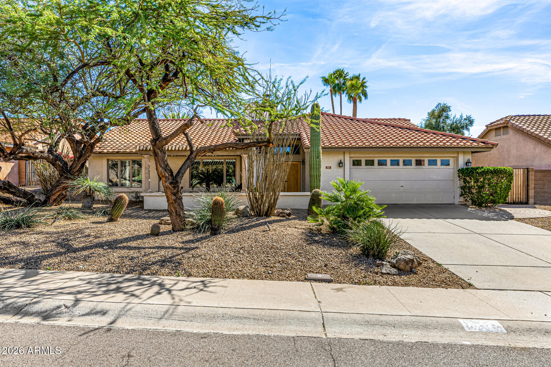 801 East Acoma Drive Phoenix, AZ 85022 - Photo 1 of 62 a front view of a house with garden