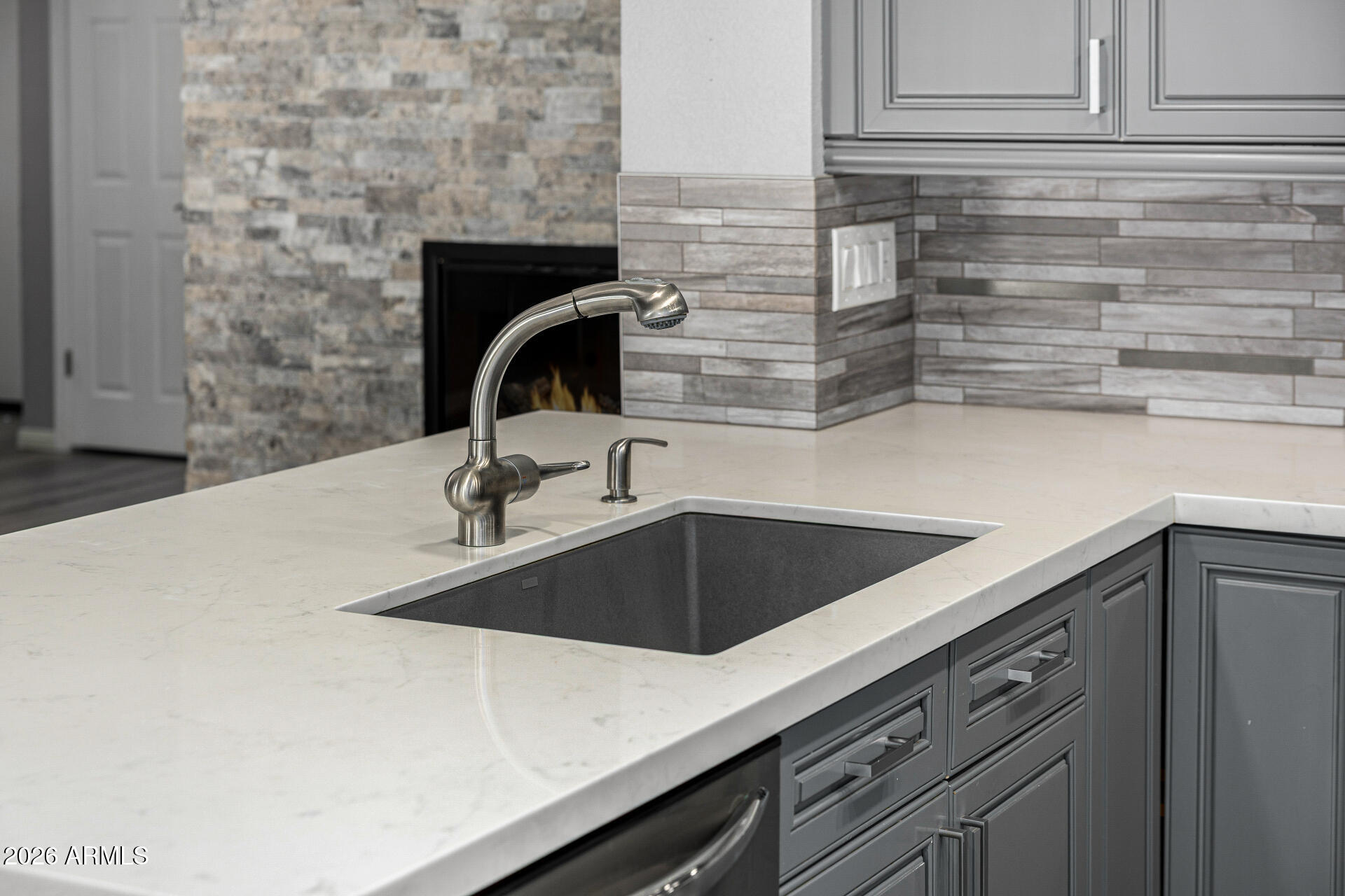 801 East Acoma Drive Phoenix, AZ 85022 - Photo 27 of 62 a kitchen with a sink and cabinets
