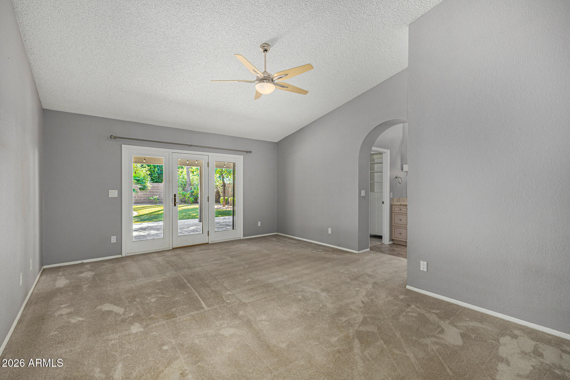 801 East Acoma Drive Phoenix, AZ 85022 - Photo 30 of 62 an empty room with windows and fan