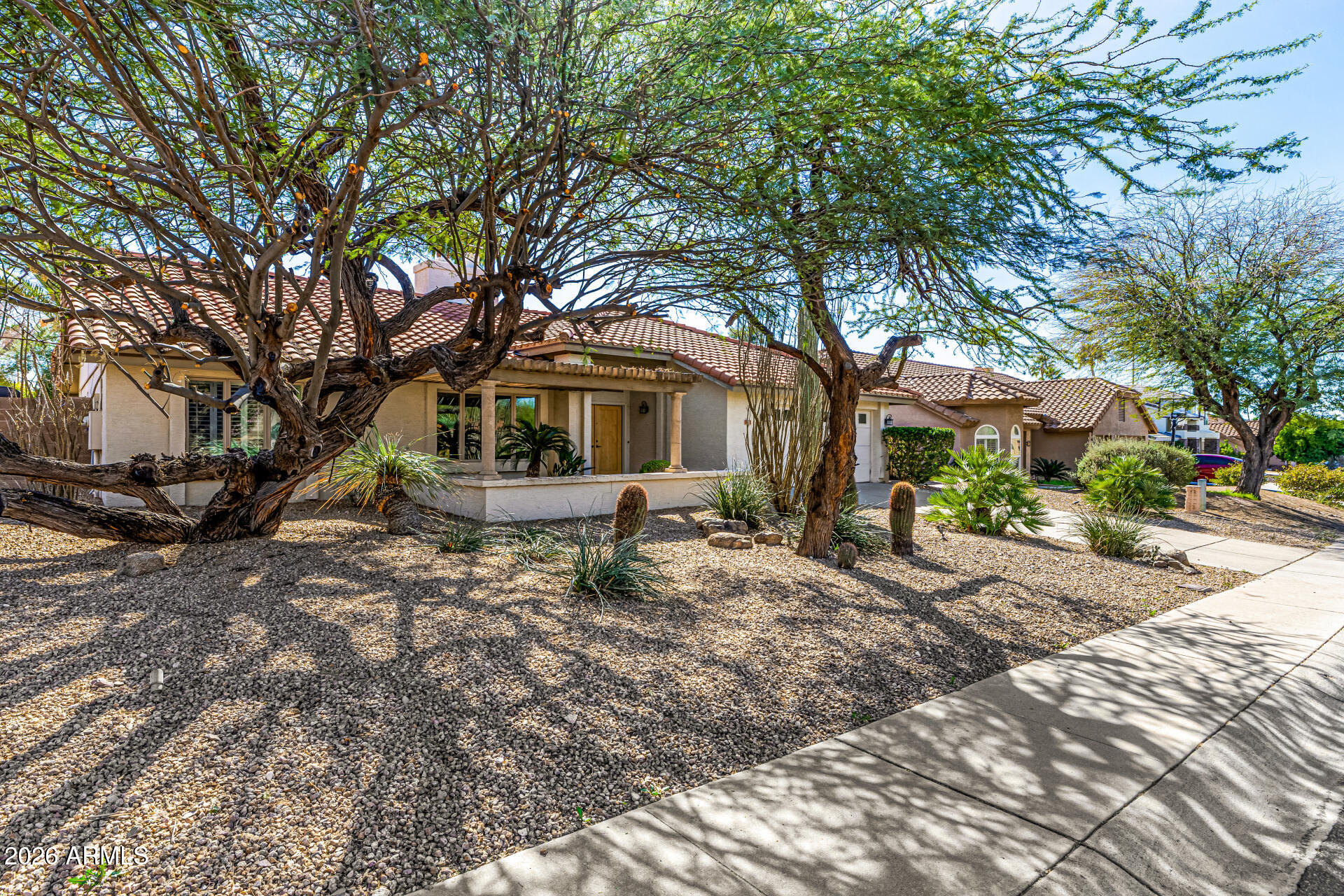 801 East Acoma Drive Phoenix, AZ 85022 - Photo 3 of 62 a house with trees in front of it