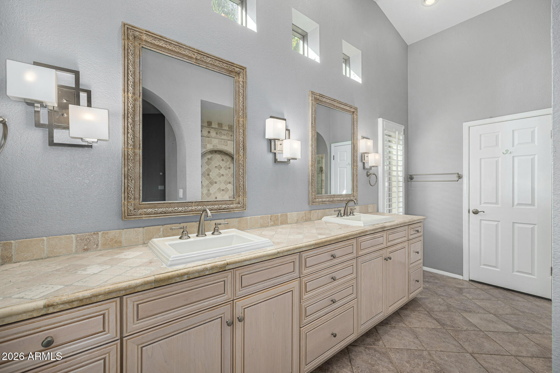 801 East Acoma Drive Phoenix, AZ 85022 - Photo 34 of 62 a bathroom with double sink and a mirror