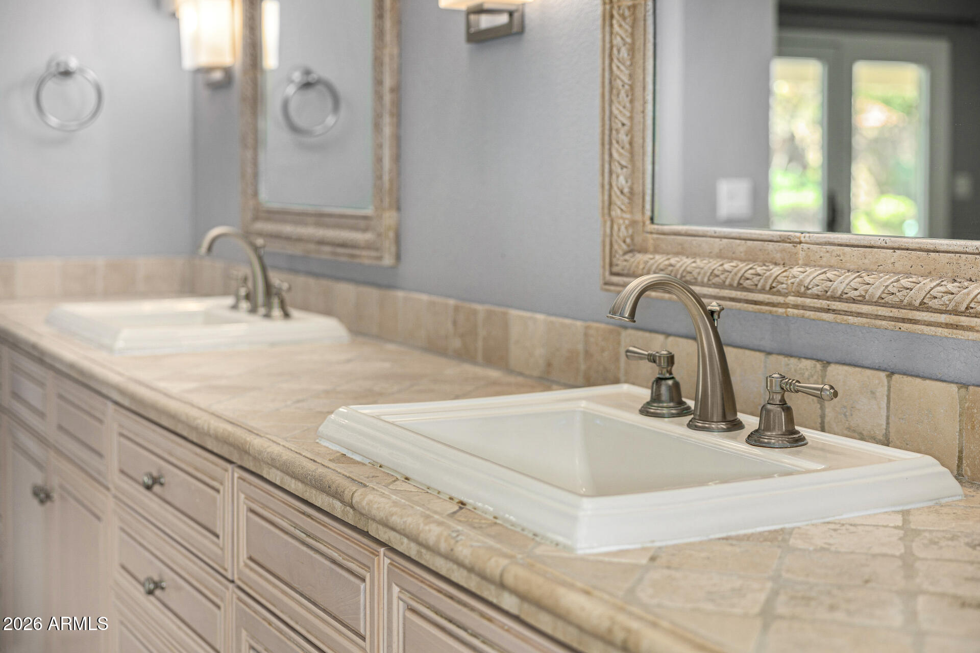801 East Acoma Drive Phoenix, AZ 85022 - Photo 38 of 62 a bathroom with a sink and a mirror