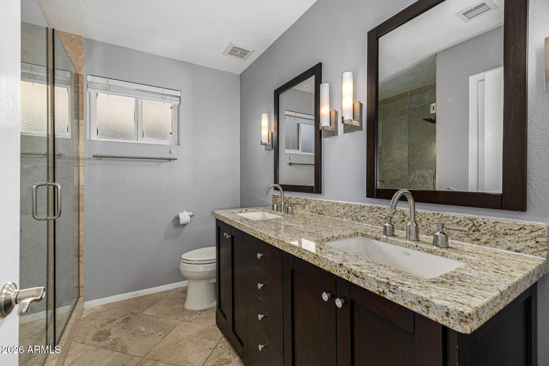 801 East Acoma Drive Phoenix, AZ 85022 - Photo 44 of 62 a bathroom with a granite countertop sink a toilet and a mirror