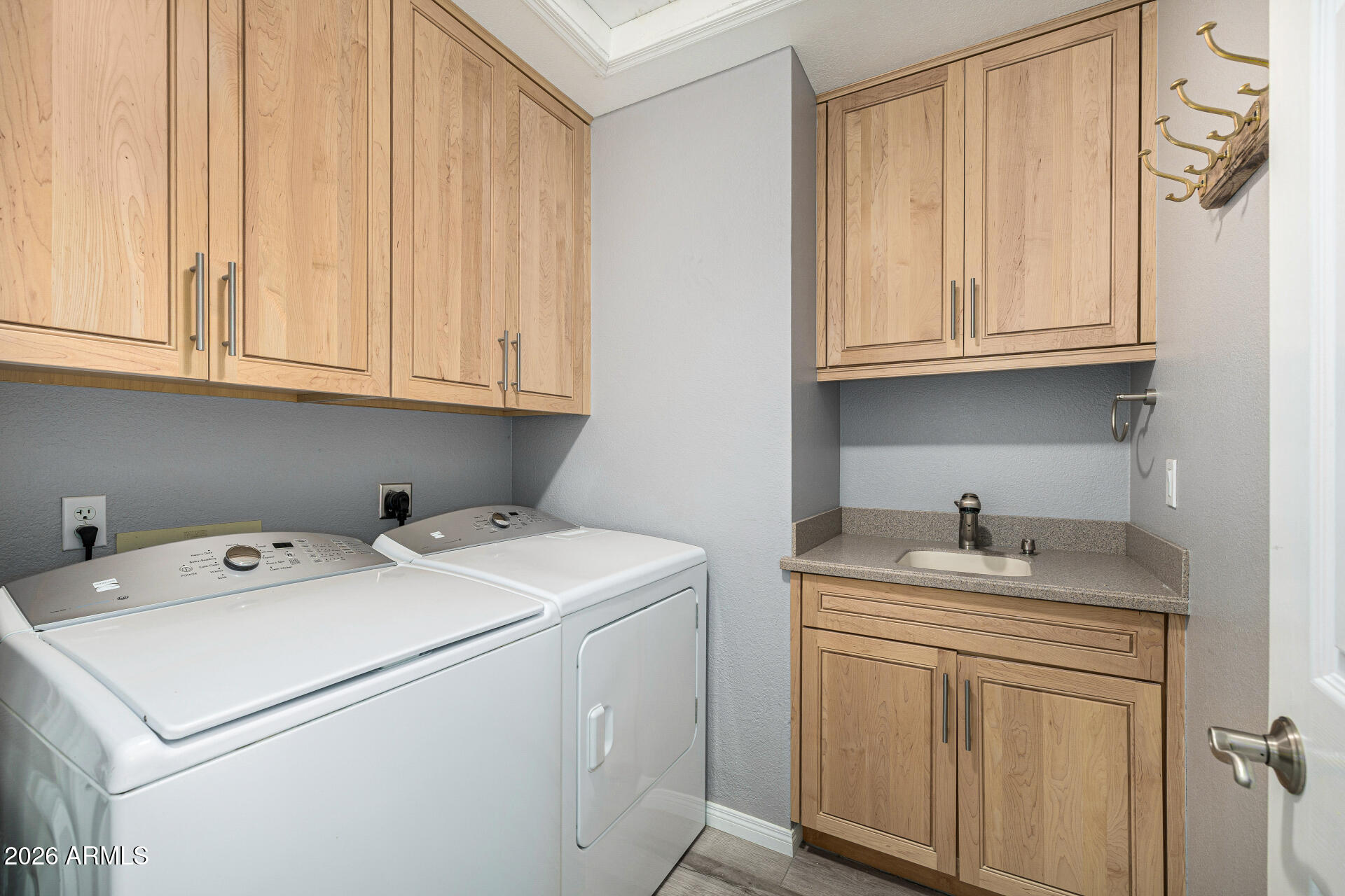 801 East Acoma Drive Phoenix, AZ 85022 - Photo 46 of 62 a utility room with sink dryer and washer