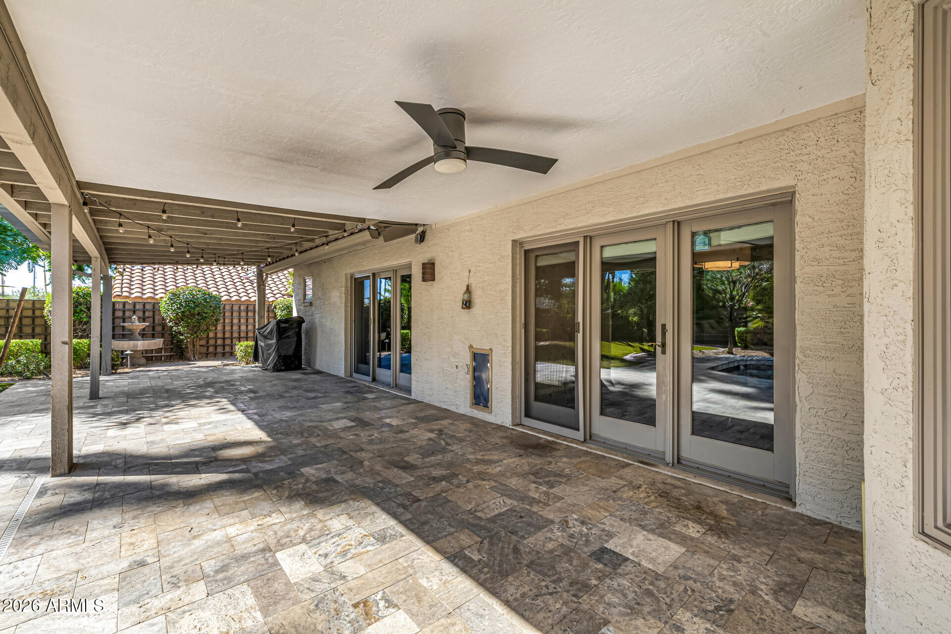 801 East Acoma Drive Phoenix, AZ 85022 - Photo 47 of 62 a view of a porch with a table and chairs