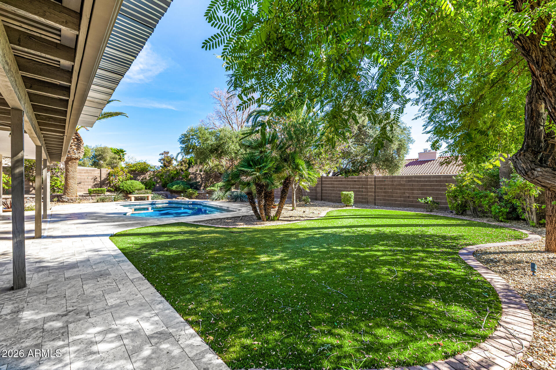 801 East Acoma Drive Phoenix, AZ 85022 - Photo 50 of 62 a front view of a house with garden