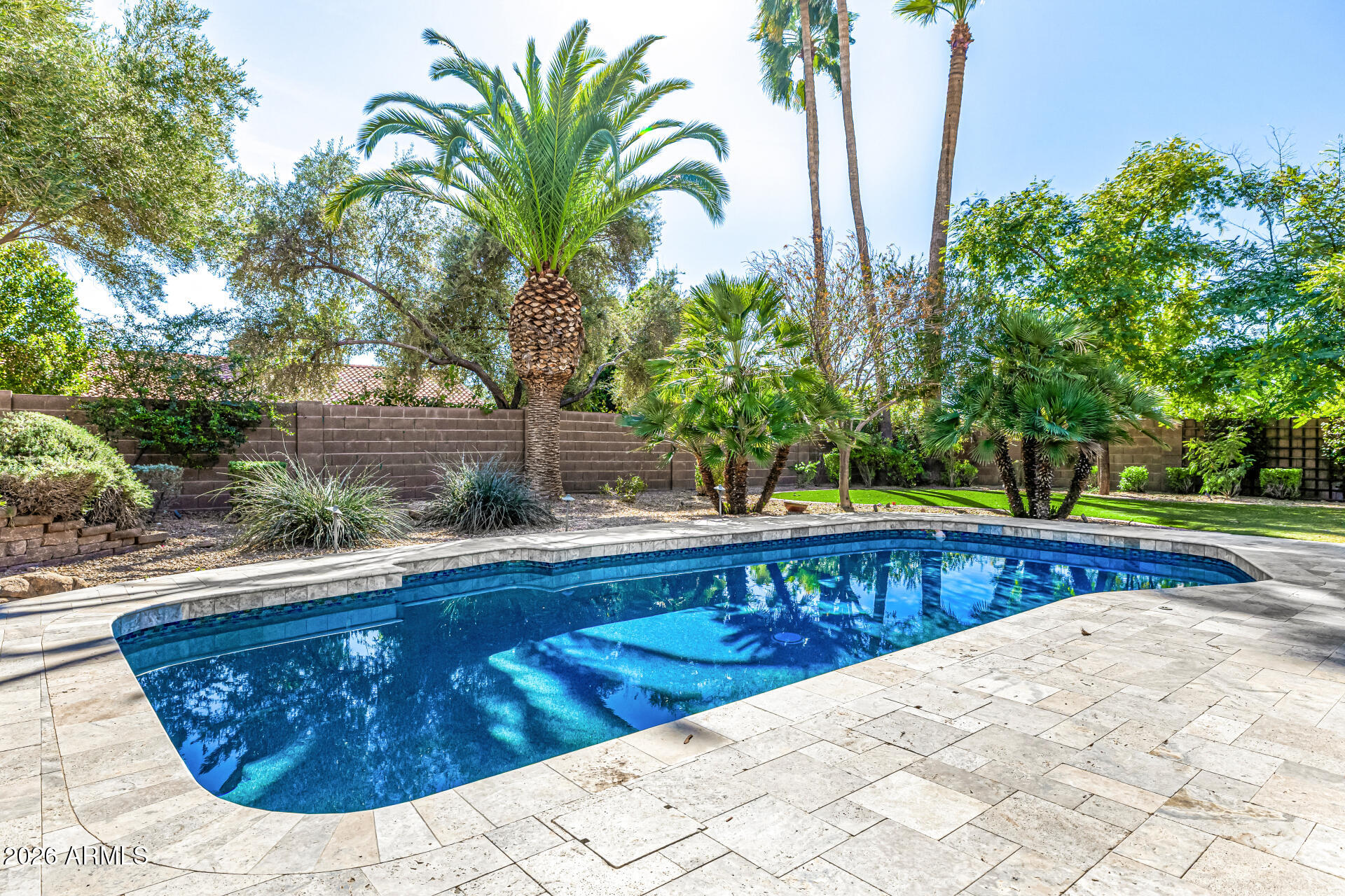 801 East Acoma Drive Phoenix, AZ 85022 - Photo 55 of 62 a swimming pool with wooden fence