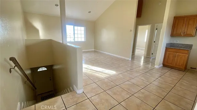 a view of a utility room with windows