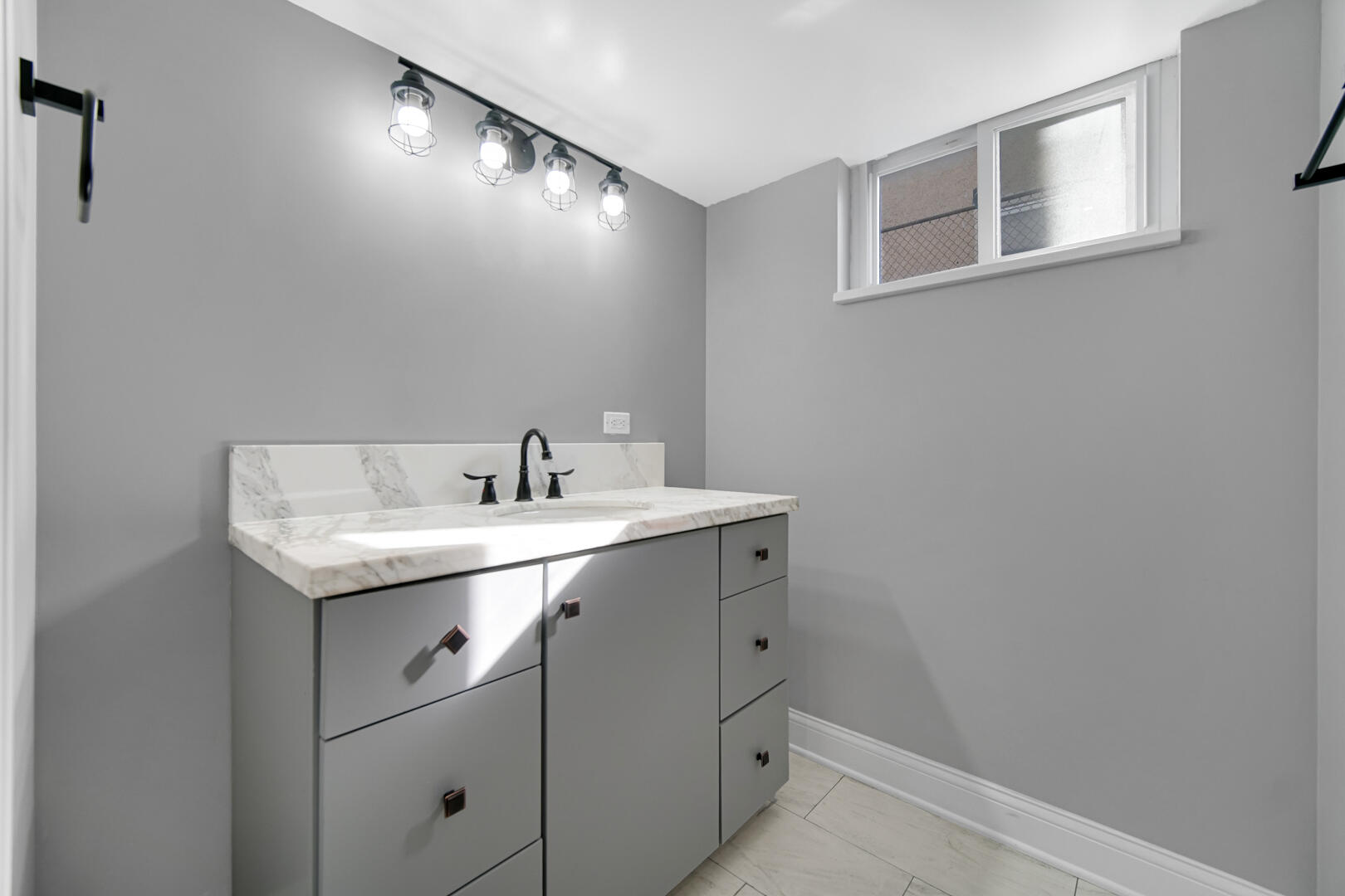 327 Buchanan Street Gary, IN 46402 - Photo 28 of 29 a utility room with cabinets washer and dryer