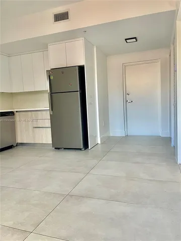 a view of a hallway with staircase