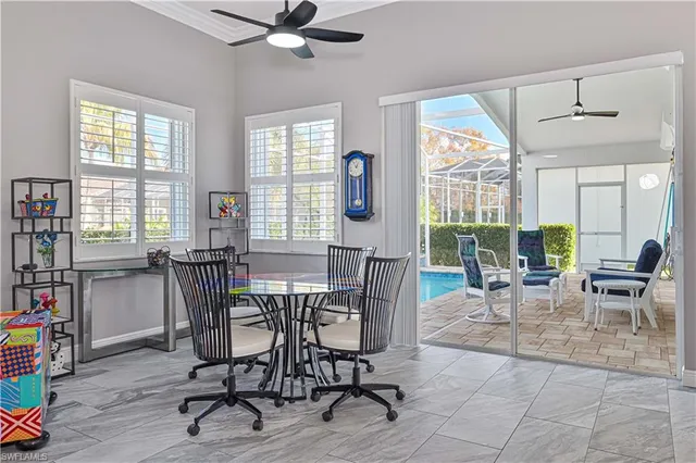 a view of a livingroom with furniture and a window