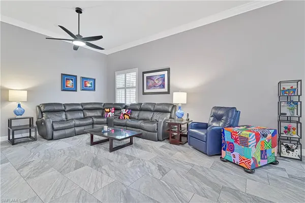 a living room with furniture and furniture