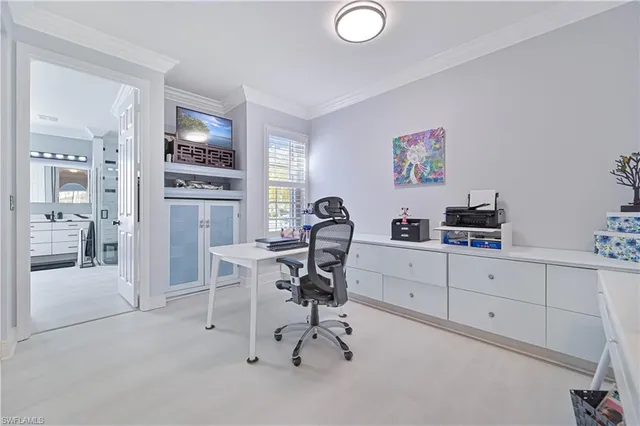 a room with cabinets and a window