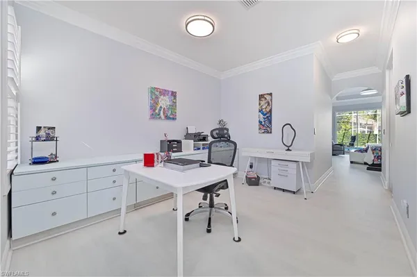 a view of a workspace with furniture