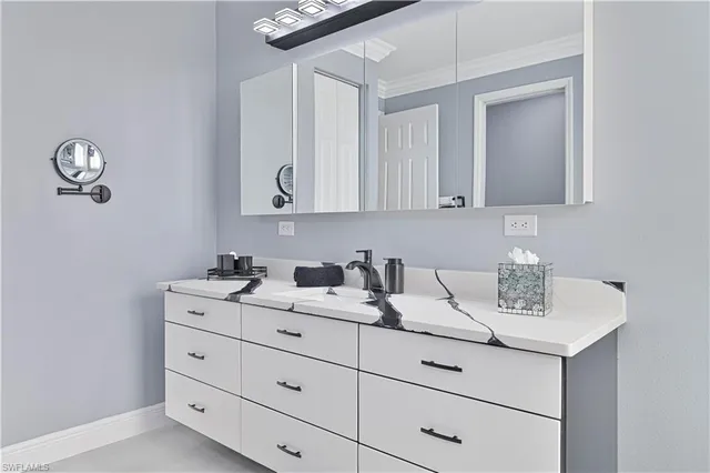 a workspace with furniture and a window