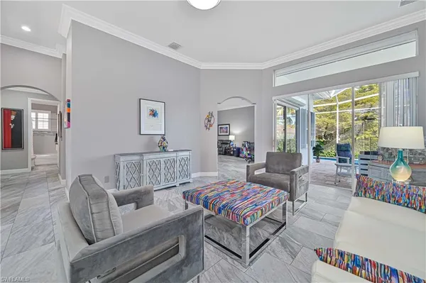 a living room with furniture and a table