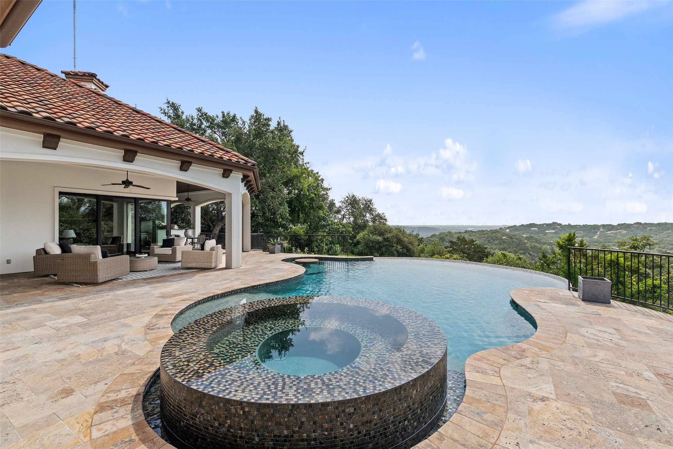 1414 The High Road Austin, TX 78746 - Photo 29 of 40 A private oasis with a sparkling pool and spa, offering endless views.