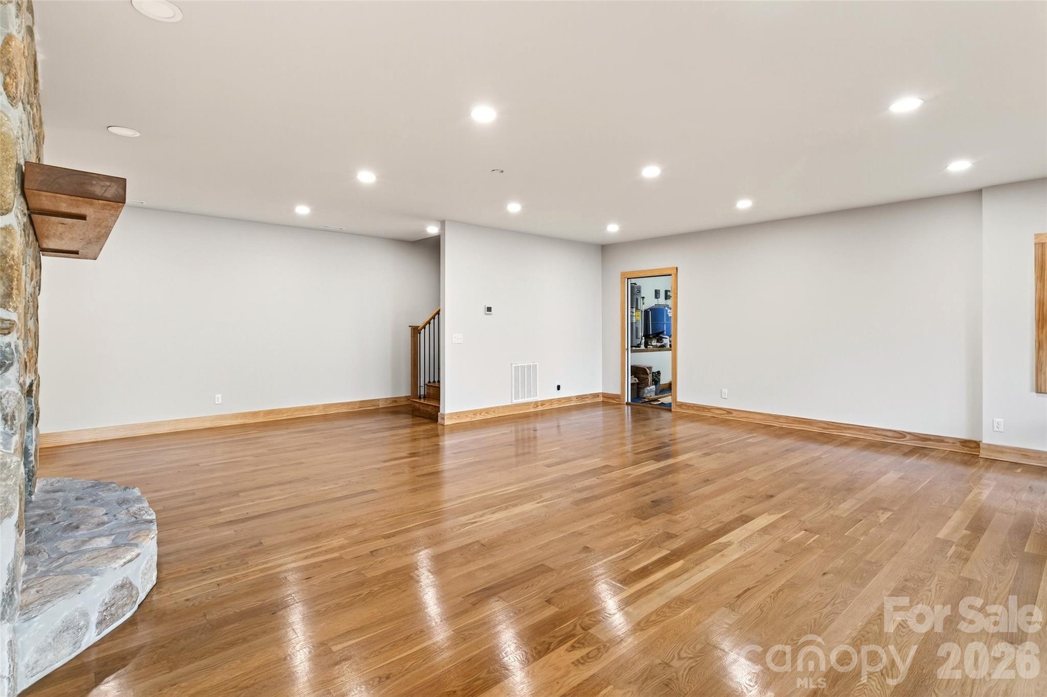 575 Croft Way Bakersville, NC 28705 - Photo 27 of 38 a view of empty room with wooden floor