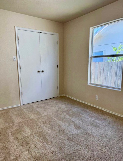 400 Blue Shale Drive Jarrell, TX 76537 - Photo 8 of 22 a view of an empty room with a window
