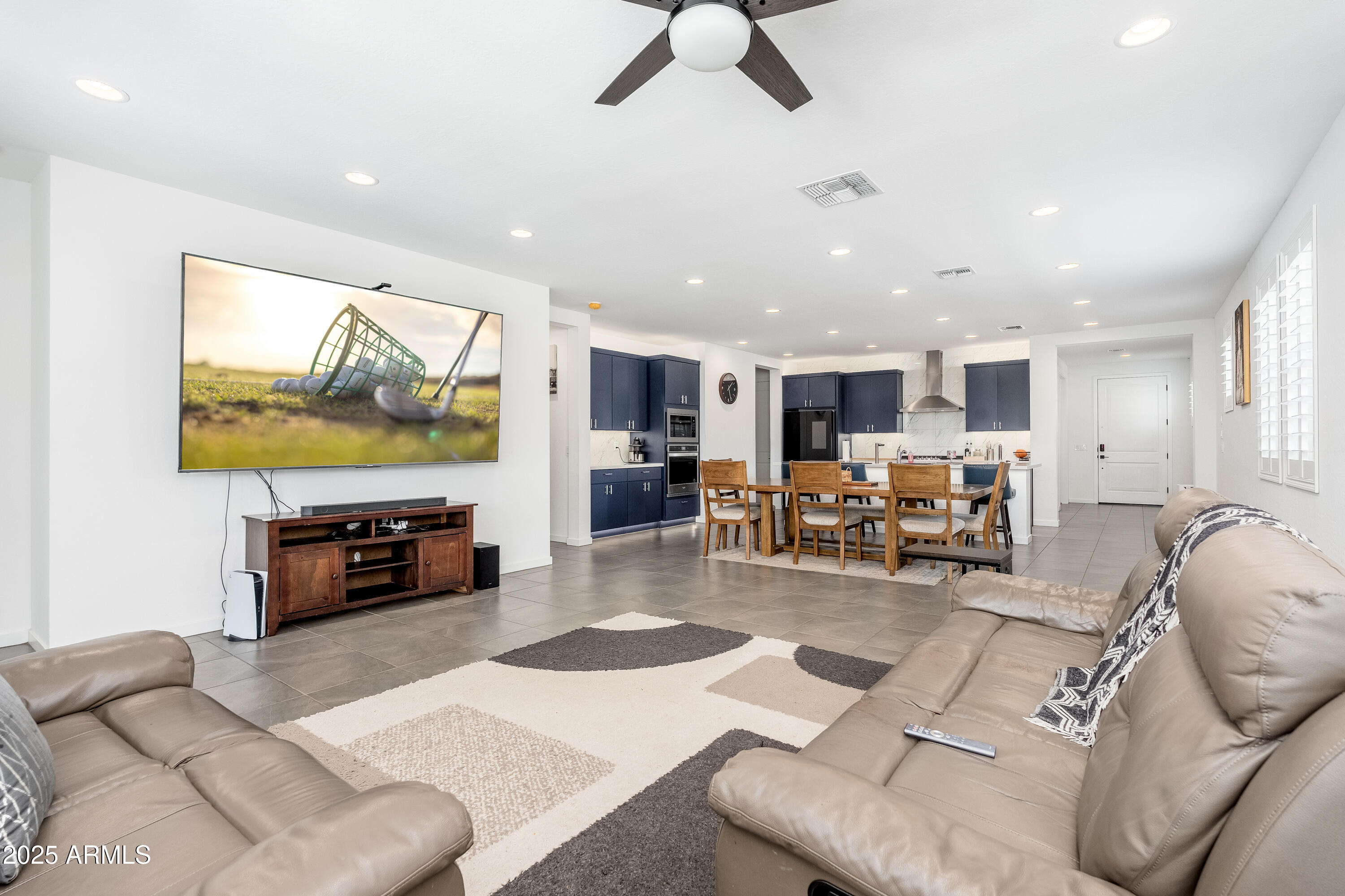 21357 East Macaw Drive Queen Creek, AZ 85142 - Photo 15 of 48 a living room with furniture and kitchen view