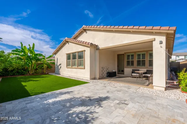 a view of a house with a patio
