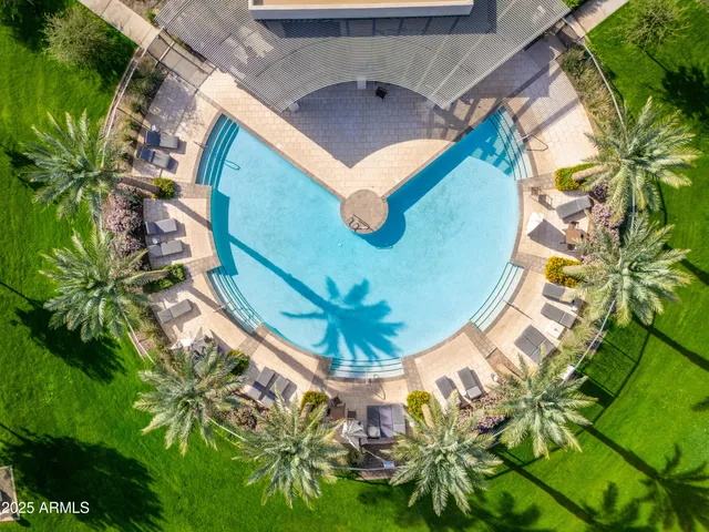 an aerial view of multiple house with a yard