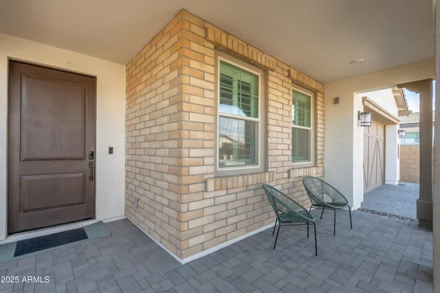 a view of an outdoor space with porch and wooden floor
