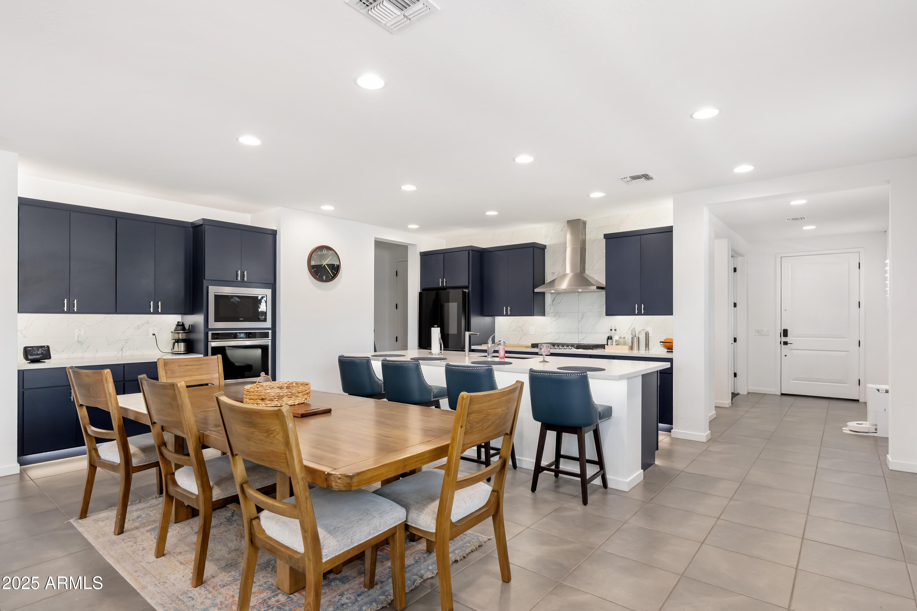 21357 East Macaw Drive Queen Creek, AZ 85142 - Photo 7 of 48 a view of a dining room with furniture