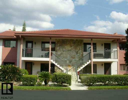 9910 Eagles Point Circle, Unit 2 Port Richey, FL 34668 - Photo 1 of 1 Exterior Front - Ground floor, corner unit