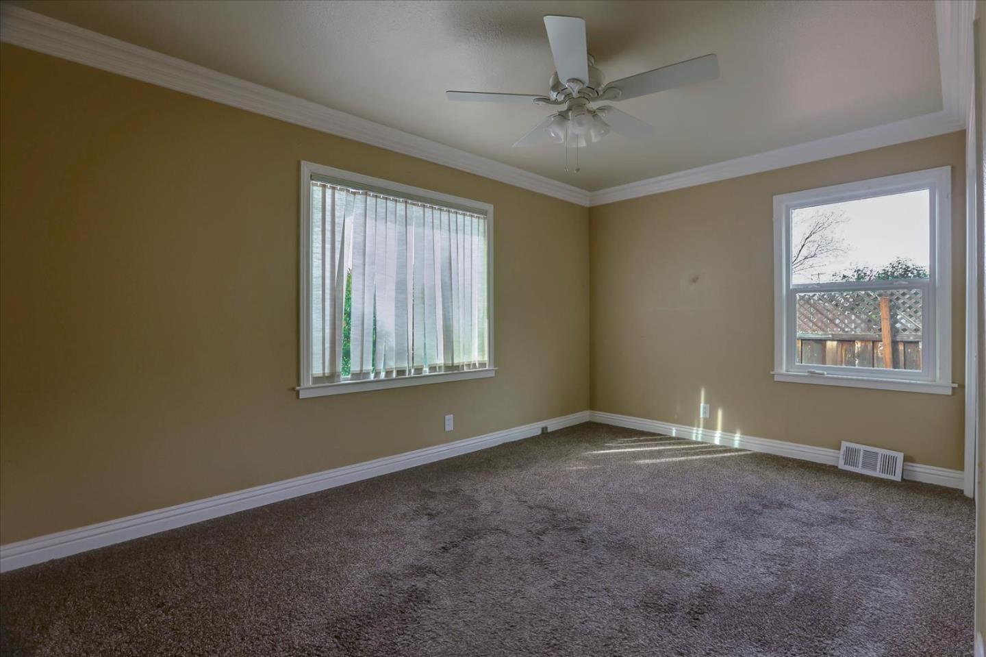 10150 Clayton Road San Jose, CA 95127 - Photo 21 of 61 a view of an empty room with a window