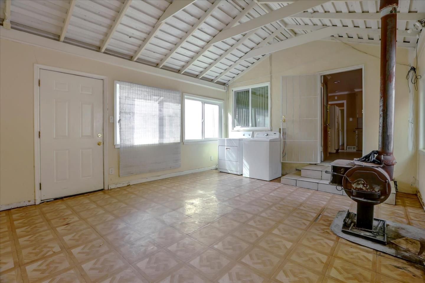 10150 Clayton Road San Jose, CA 95127 - Photo 23 of 61 a view of a livingroom with furniture and floor to ceiling window
