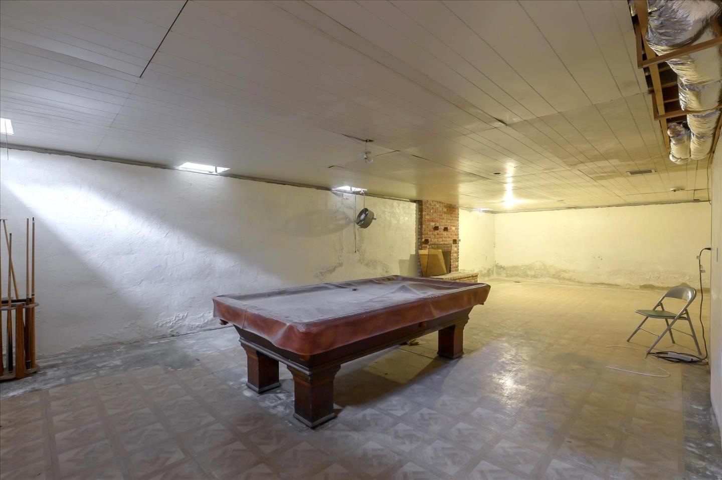 10150 Clayton Road San Jose, CA 95127 - Photo 27 of 61 a room with pool tables and chair