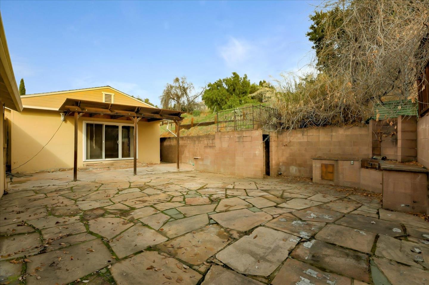 10150 Clayton Road San Jose, CA 95127 - Photo 29 of 61 a front view of a house with a yard