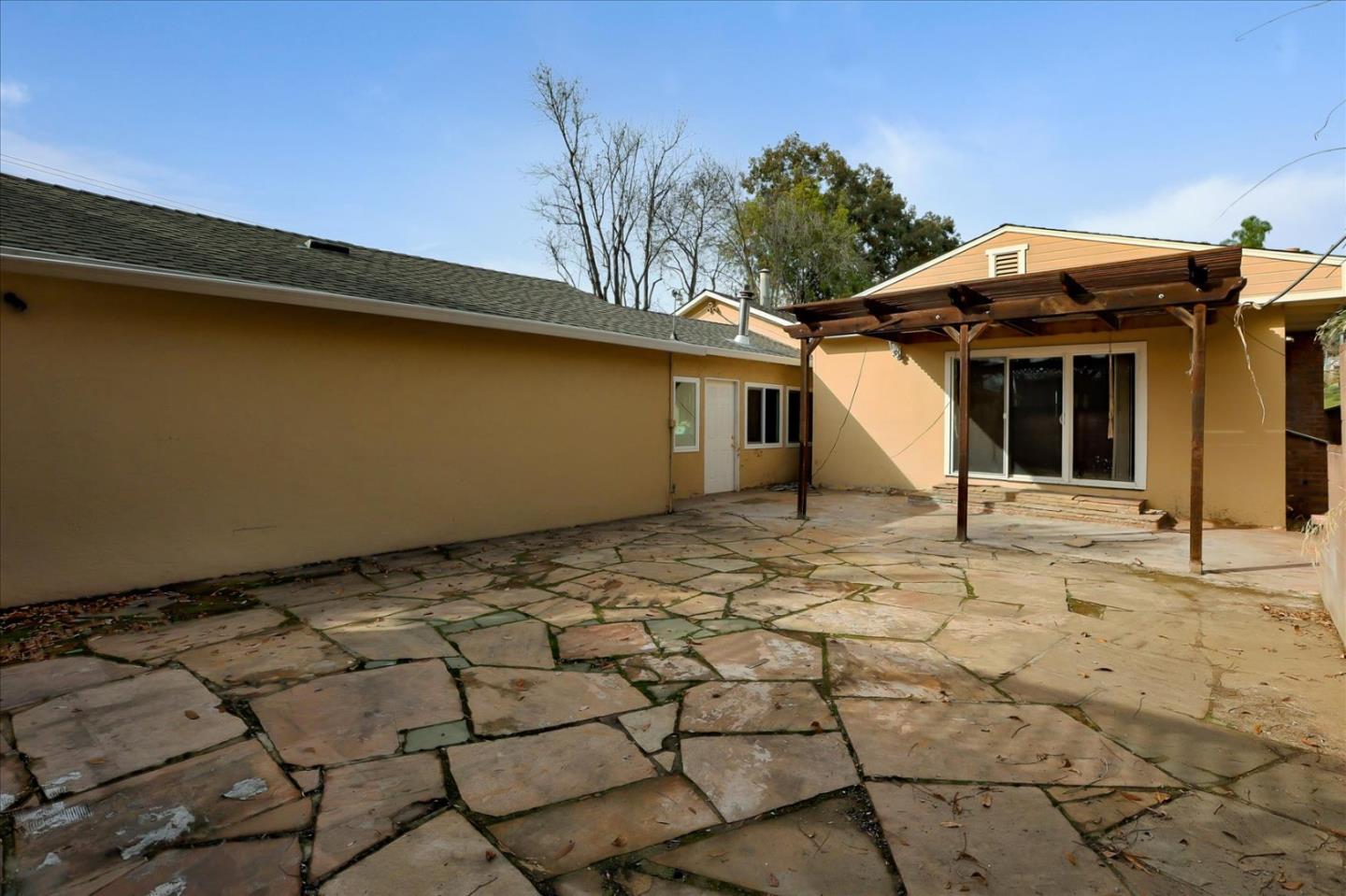 10150 Clayton Road San Jose, CA 95127 - Photo 30 of 61 a view of a house with a backyard