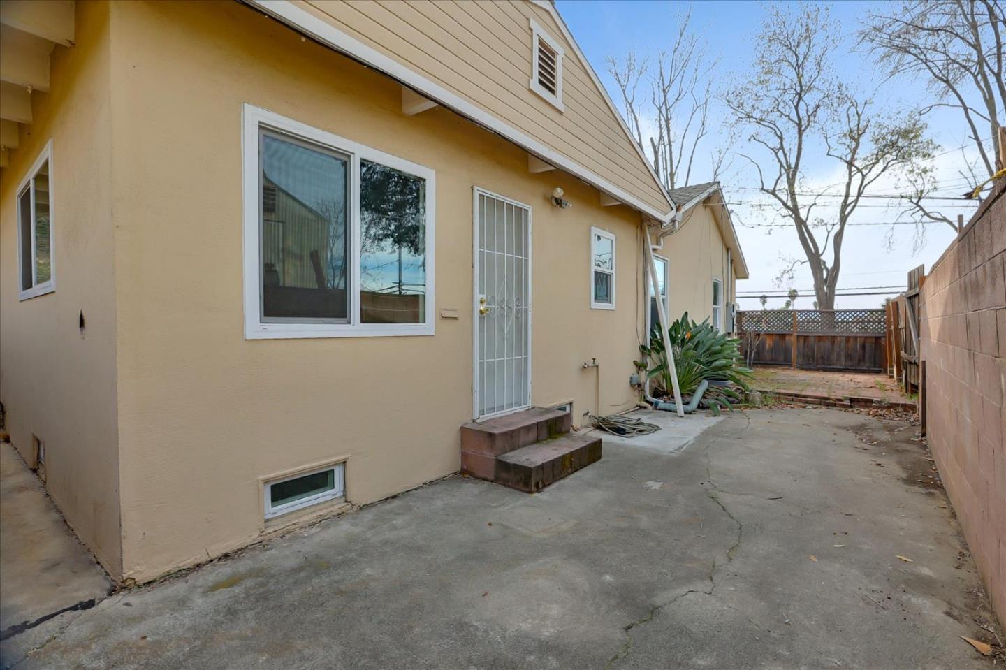 10150 Clayton Road San Jose, CA 95127 - Photo 32 of 61 a view of a house with backyard and sitting area