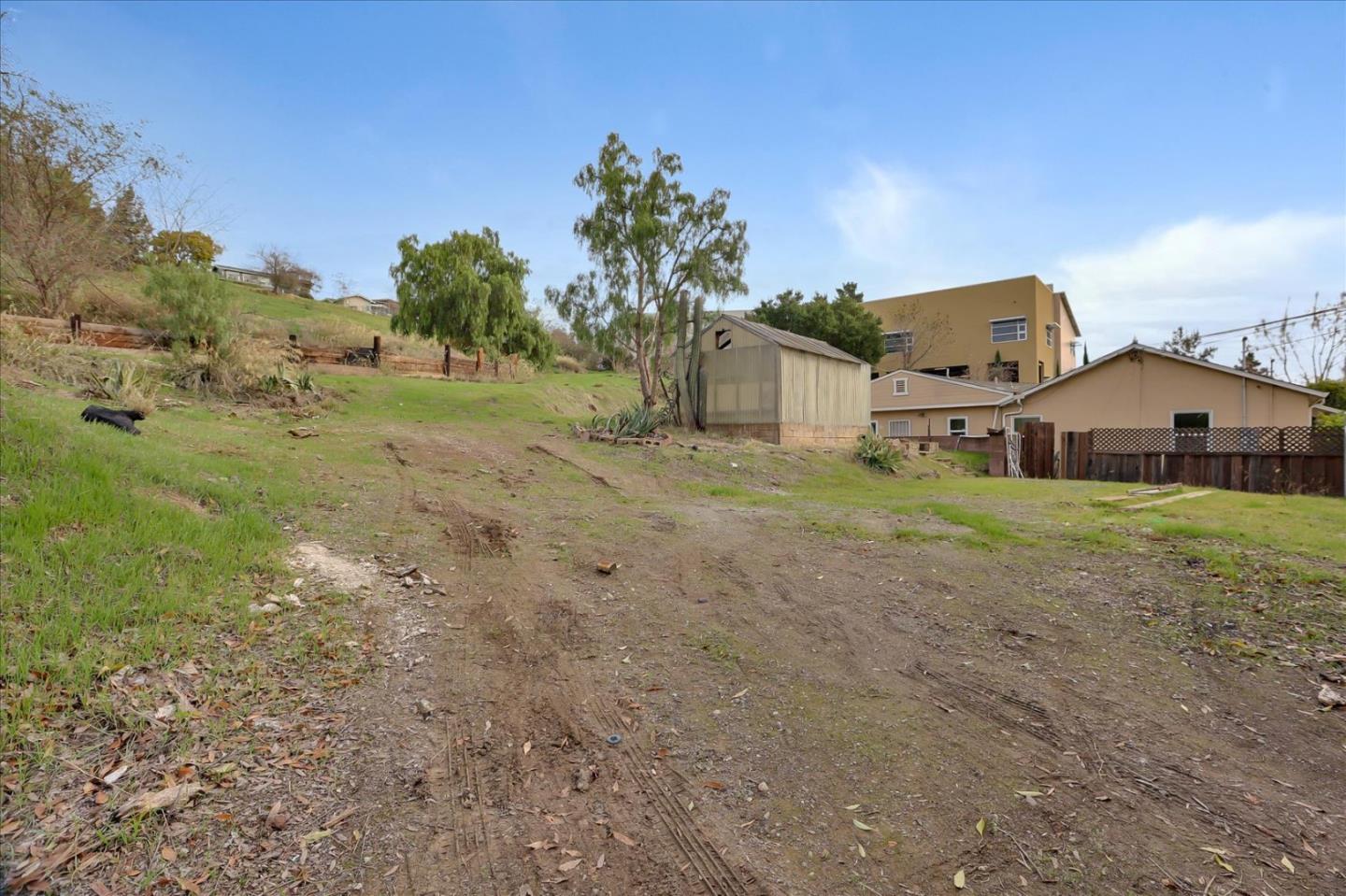 10150 Clayton Road San Jose, CA 95127 - Photo 36 of 61 a front view of a house with a yard