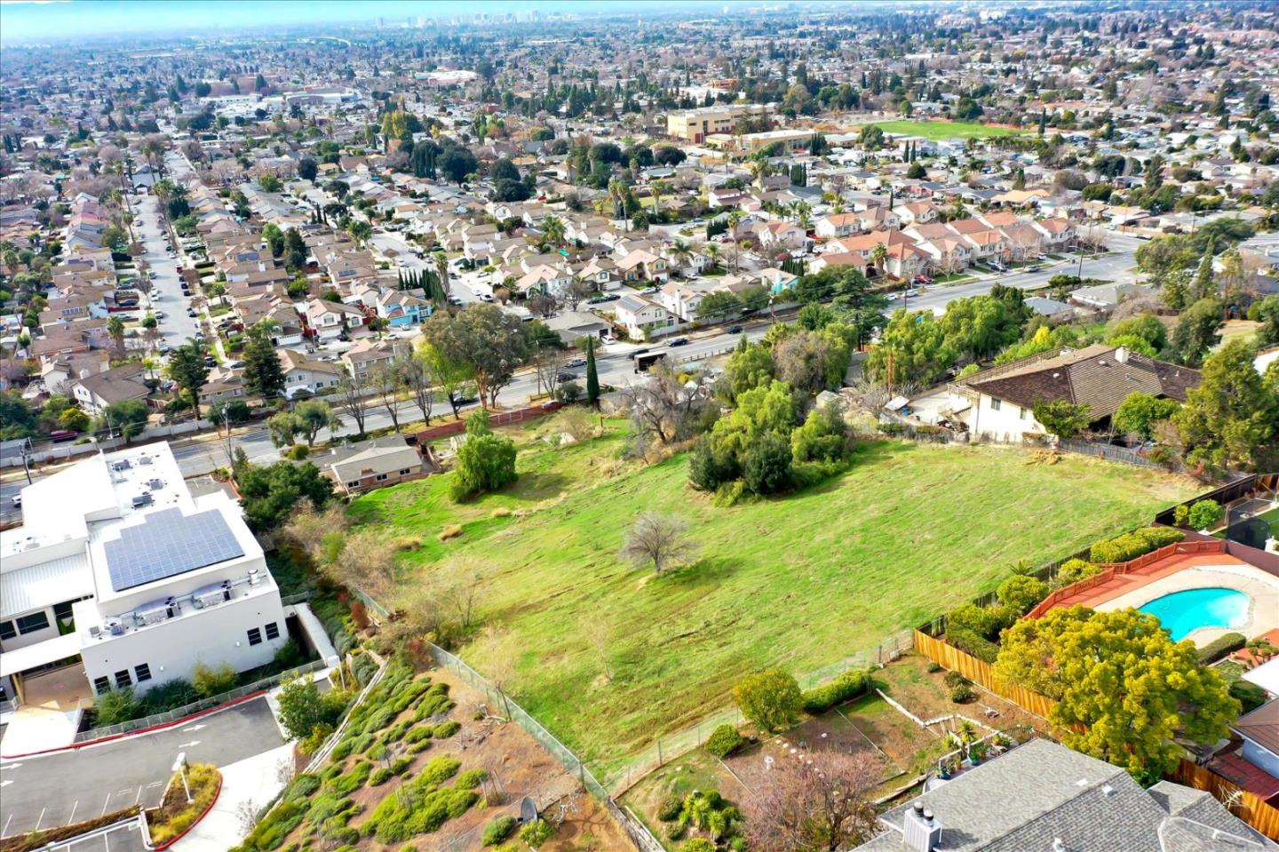 10150 Clayton Road San Jose, CA 95127 - Photo 48 of 61 an aerial view of residential houses with outdoor space
