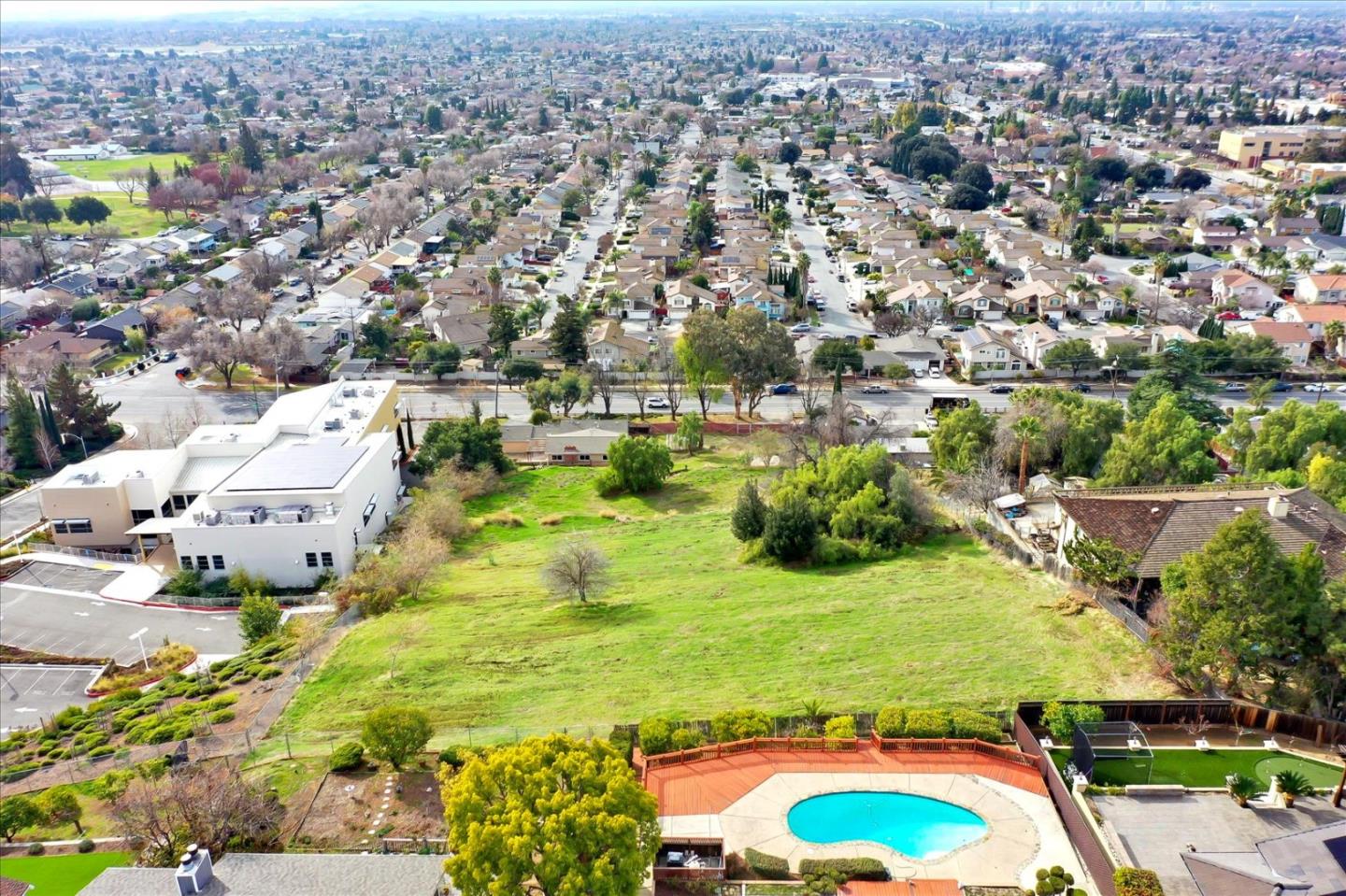 10150 Clayton Road San Jose, CA 95127 - Photo 49 of 61 an aerial view of residential houses with outdoor space