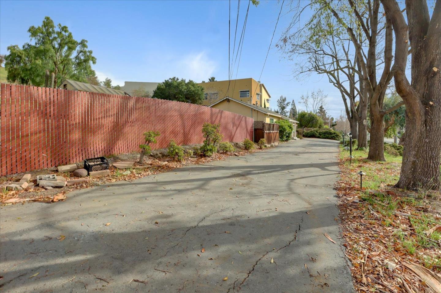 10150 Clayton Road San Jose, CA 95127 - Photo 58 of 61 a view of a street with a building in the background