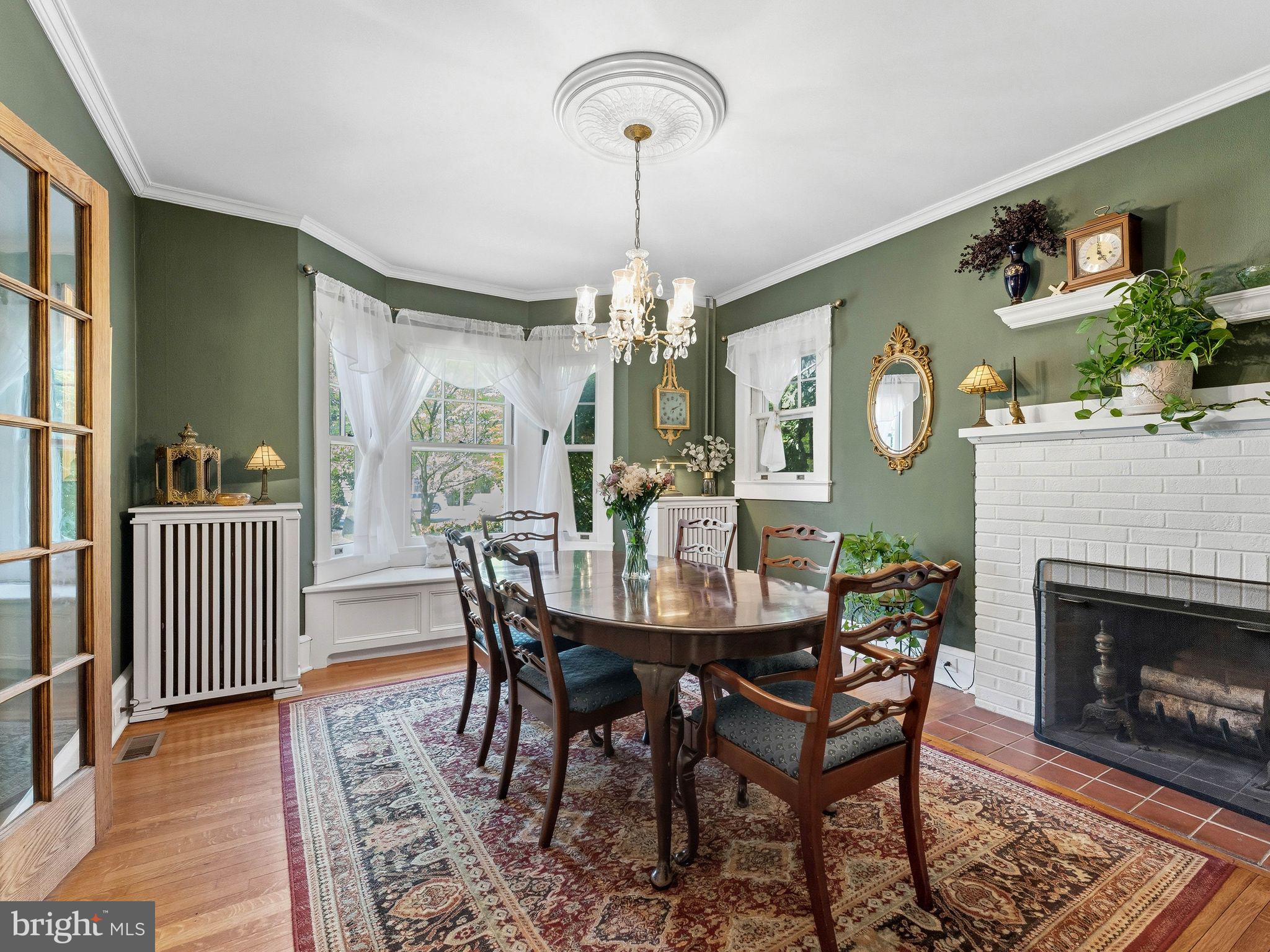 229 North Main Street Woodstown, NJ 08098 - Photo 21 of 74 a view of a dining room with furniture and a chandelier